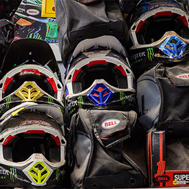 Eli Tomac's helmets piled up