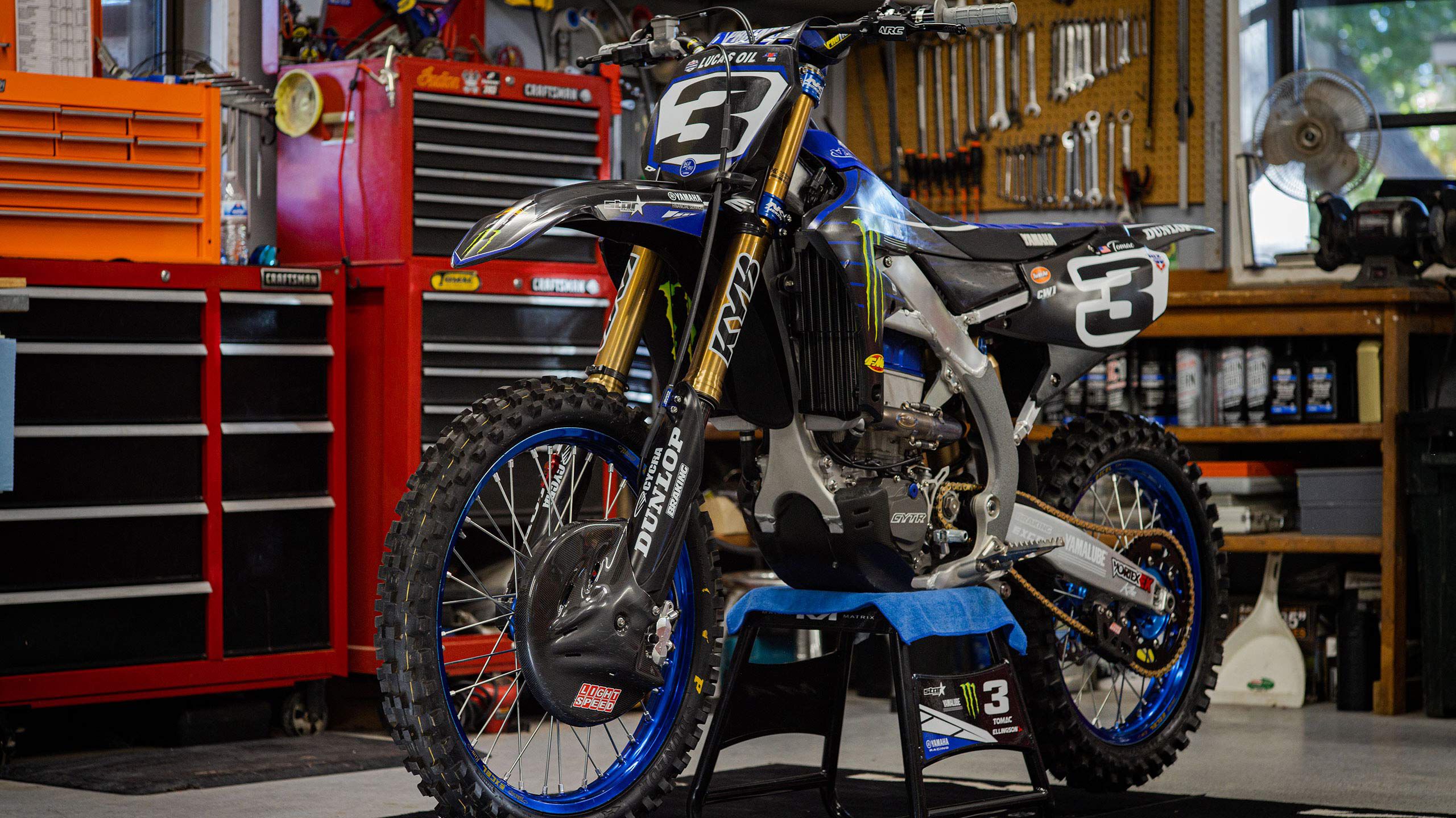 Eli Tomac's bike on a garage